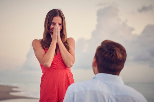 Surprise proposal photographed at Jupiter Beach, FL